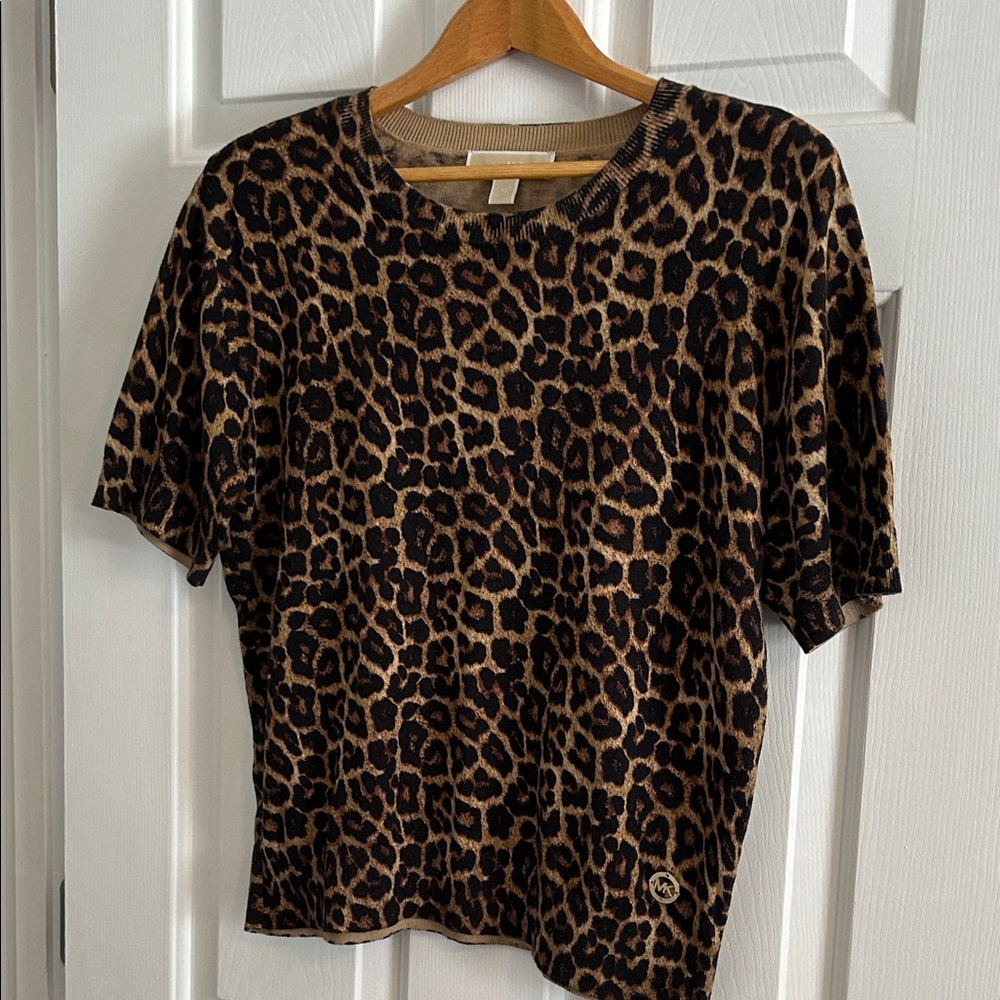 Women’s Michael Kors short sleeve sweater 
XL good condition leopard print